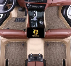 Ascot Ivory custom car floor mats with oatmeal coil carpet set into cream ribbed leather, fitted across the front and rear footwells
