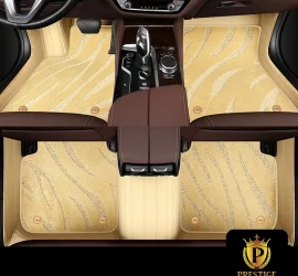 Onyx Beige custom car floor mats in champagne wave-textured carpet with a matching beige leather surround, fitted front and rear
