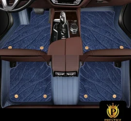 Onyx Blue custom car floor mats in deep denim-blue wave-textured carpet with a slate-blue leather surround, fitted front and rear