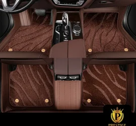 Onyx Brown custom car floor mats in chocolate wave-textured carpet with a matching brown leather surround, fitted front and rear