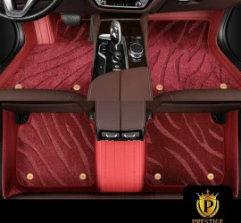 Onyx Crimson custom car floor mats in deep wine-red wave-textured carpet with a matching red leather surround, fitted front and rear