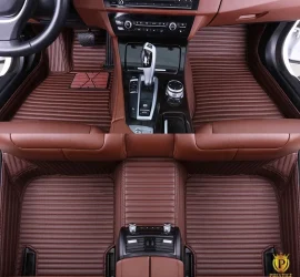 Portofino Brown custom car floor mats in deep chocolate ribbed leather with tonal stitching, fitted across the front and rear footwells