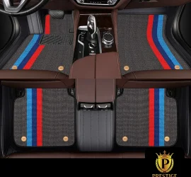 Riviera Slate custom car floor mats in grey carpet with a blue and red racing stripe, fitted across the front and rear footwells