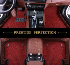 Sovereign Claret custom car floor mats in deep wine-red coil carpet with brown leather edging, fitted across the front and rear footwells