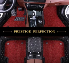 Sovereign Rosso custom car floor mats in bright red coil carpet with black leather edging and cream stitching, fitted front and rear