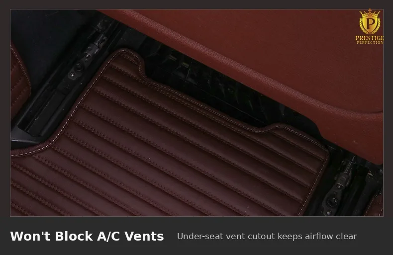 Close-up of a Sovereign Series car mat shaped around an under-seat air conditioning vent so airflow to the rear seats stays clear