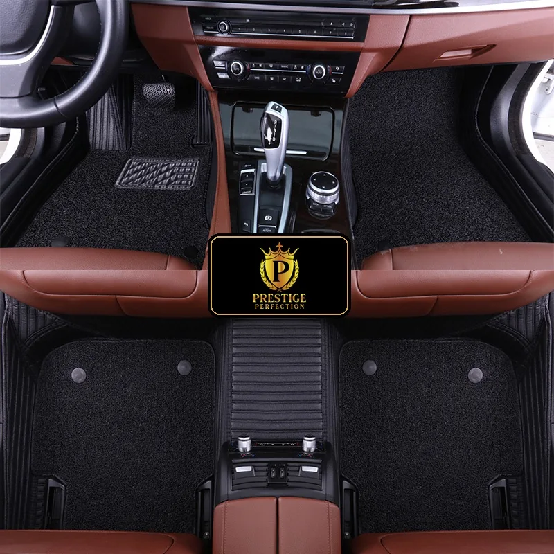 Ascot Jet custom car floor mats with black coil carpet set into black ribbed leather, fitted across the front and rear footwells