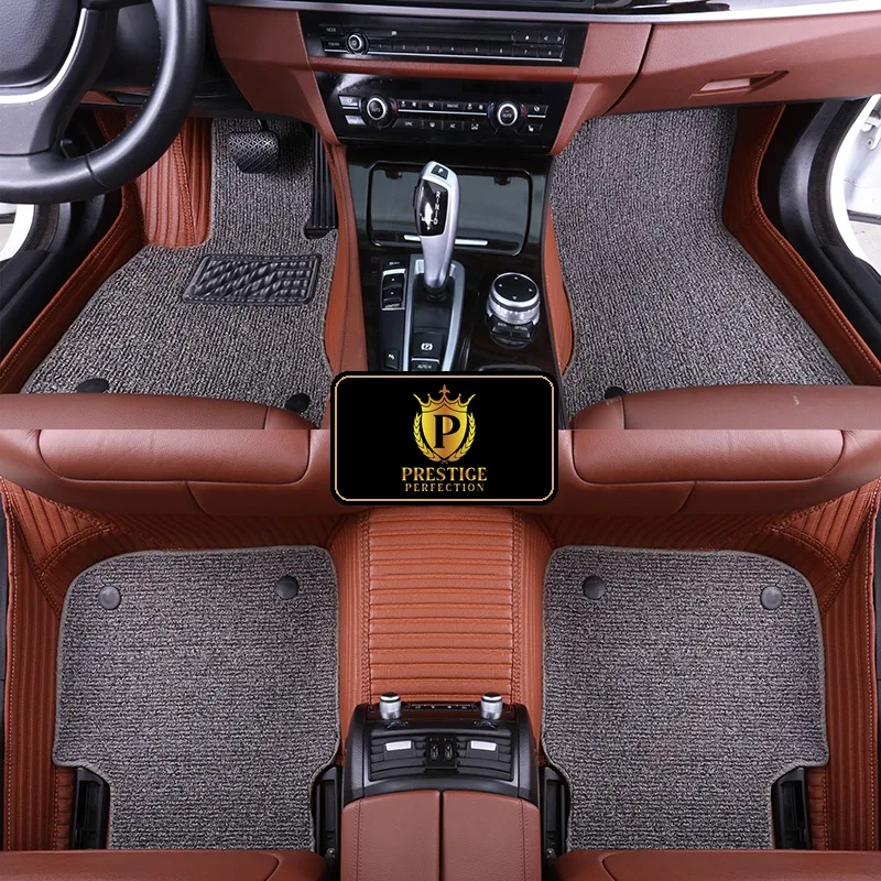 Ascot Pewter custom car floor mats with grey coil carpet set into a tan ribbed leather base, fitted across the front and rear footwells