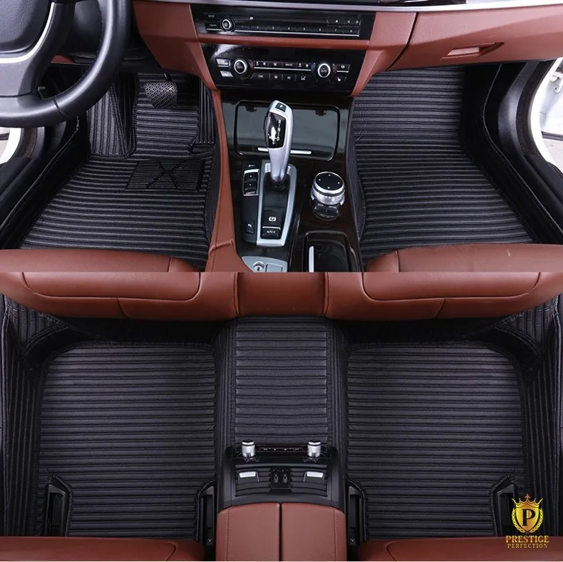 Portofino Black custom car floor mats in black ribbed leather with tonal stitching, fitted front and rear in a car with a tan interior