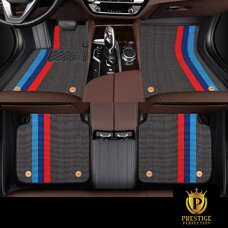 Riviera Slate custom car floor mats in grey carpet with a blue and red racing stripe, fitted across the front and rear footwells