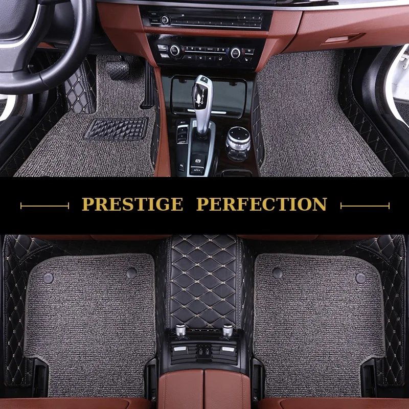 Sovereign Graphite custom car floor mats in dark grey coil carpet with black leather edging and cream stitching, fitted front and rear