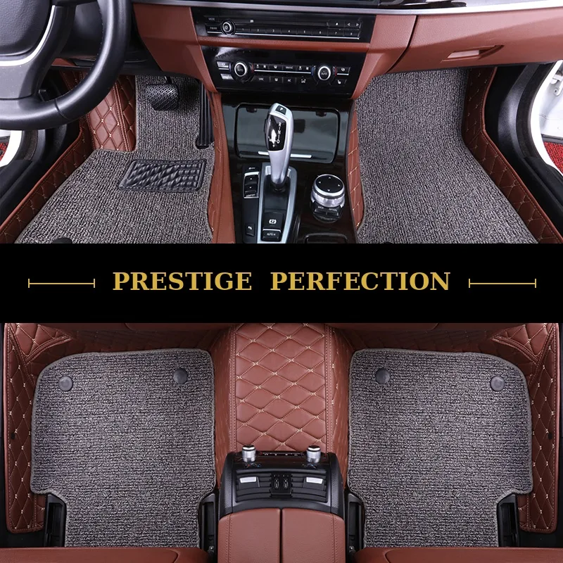 Sovereign Sterling custom car floor mats in light grey coil carpet with black leather edging and cream stitching, fitted front and rear