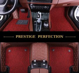 Sovereign Claret custom car floor mats in deep wine-red coil carpet with brown leather edging, fitted across the front and rear footwells