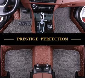 Sovereign Sterling custom car floor mats in light grey coil carpet with black leather edging and cream stitching, fitted front and rear