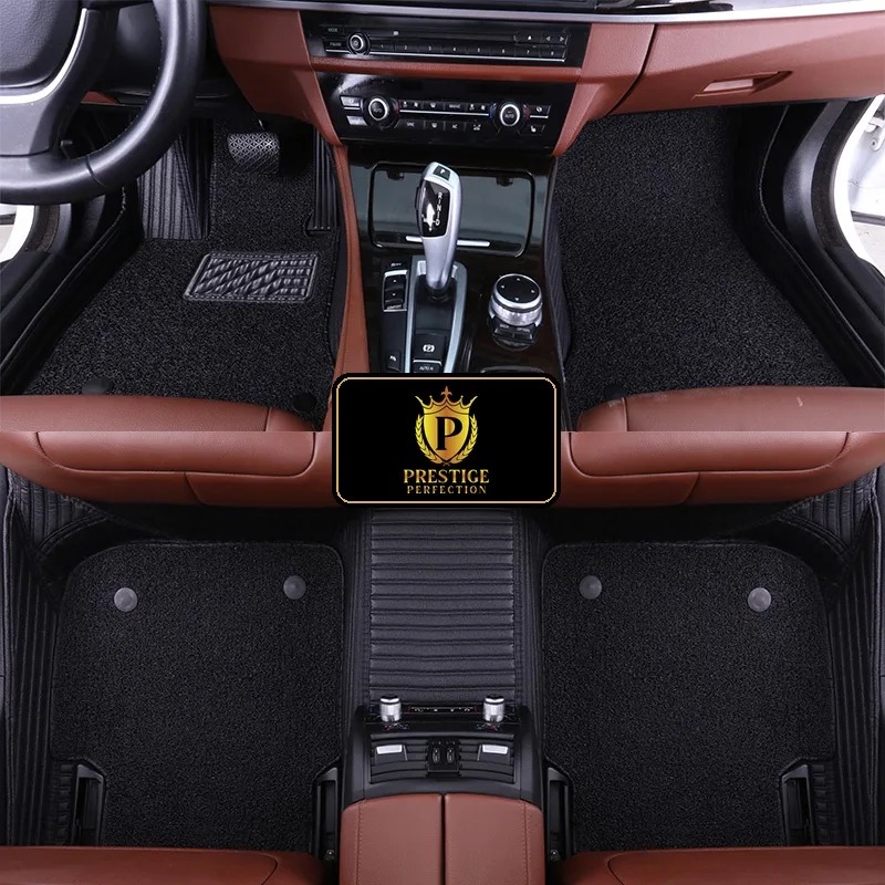Ascot Jet custom car floor mats with black coil carpet set into black ribbed leather, fitted across the front and rear footwells