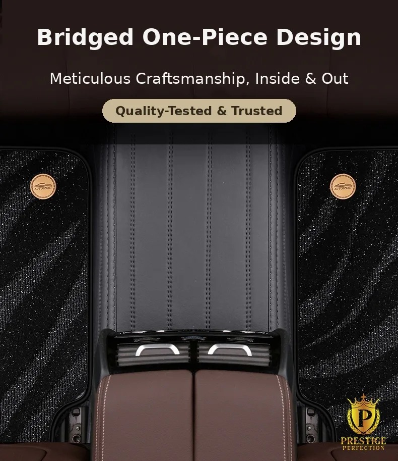 Riviera Series rear mat shown as one bridged piece covering the transmission tunnel between the rear footwells, with gold badge studs