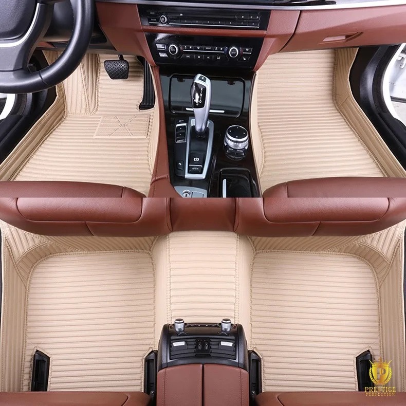 Portofino Beige custom car floor mats in cream ribbed leather with tonal stitching, fitted across the front and rear footwells of a car