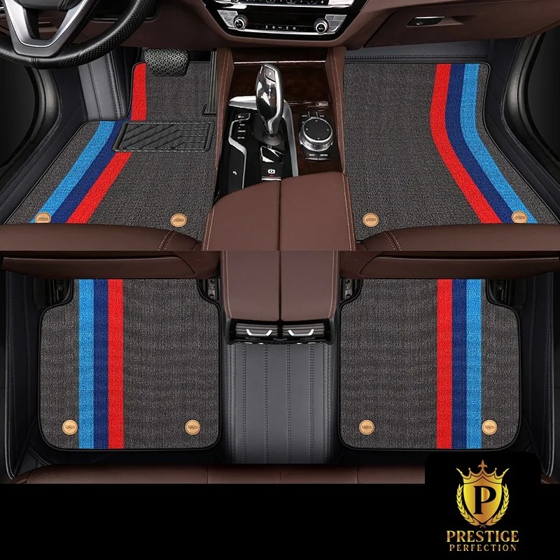 Riviera Slate custom car floor mats in grey carpet with a blue and red racing stripe, fitted across the front and rear footwells