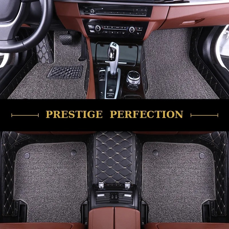 Sovereign Graphite custom car floor mats in dark grey coil carpet with black leather edging and cream stitching, fitted front and rear