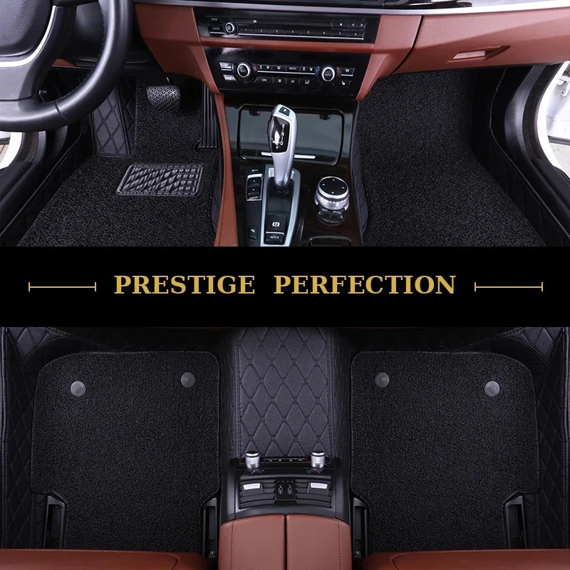 Sovereign Raven custom car floor mats in all-black coil carpet with black leather edging and black stitching, fitted front and rear