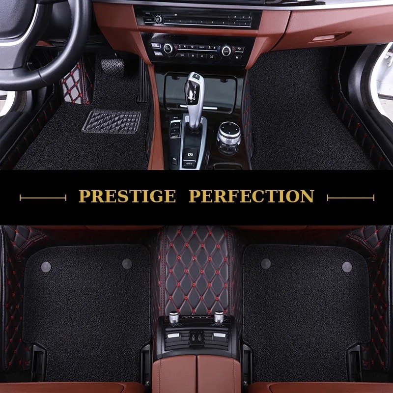 Sovereign Sable custom car floor mats in black coil carpet with black leather edging and red contrast stitching, fitted front and rear