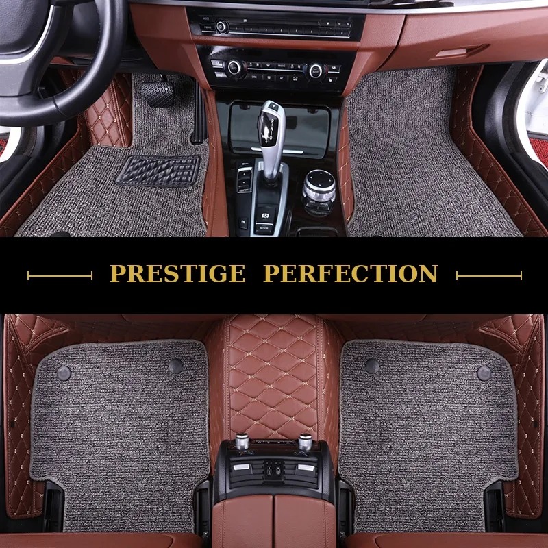 Sovereign Sterling custom car floor mats in light grey coil carpet with black leather edging and cream stitching, fitted front and rear